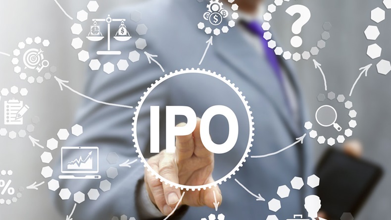 Hand reaches out to touch 'IPO' button on touch screen