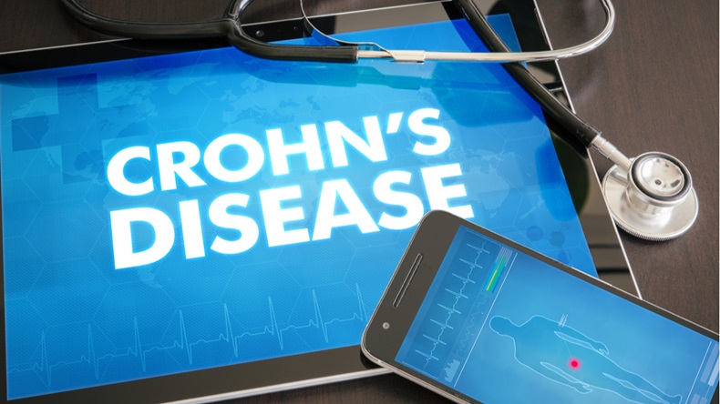 Crohn's disease (gastrointestinal disease) diagnosis medical concept on tablet screen with stethoscope. - Image 