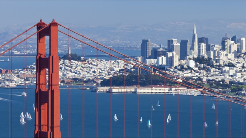 Golden Gate bridge with city in background, San Fransisco, CA