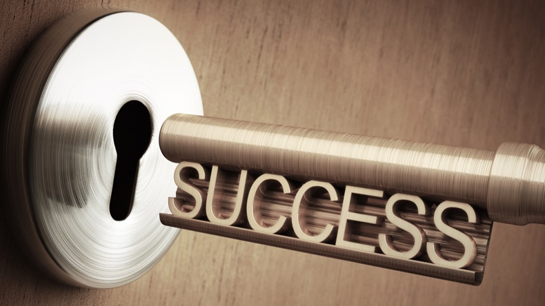 The key of success close to open the door.