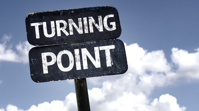 Turning Point sign with clouds and sky background 