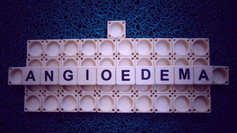 angioedema word cube with background