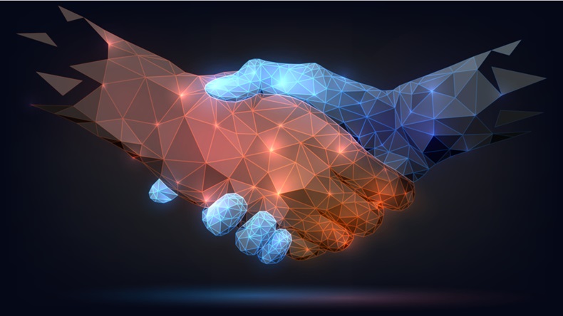 Two polygonal glowing hands, handshake, technology, business, trust concept
