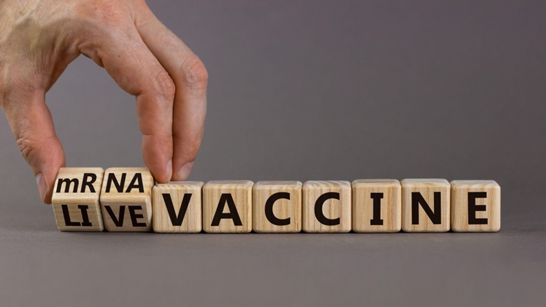 Wooden blocks showing mRNA vaccine