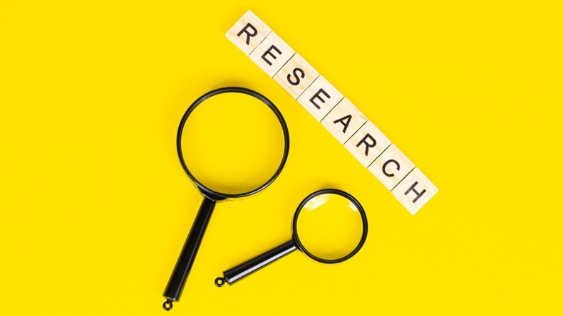 Research Concept With Magnifying Glass