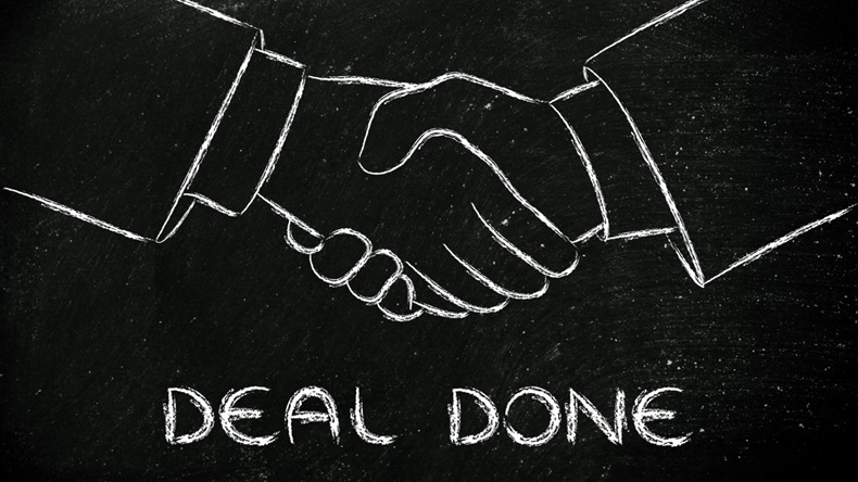 Handshake Showing Concept Of A Deal