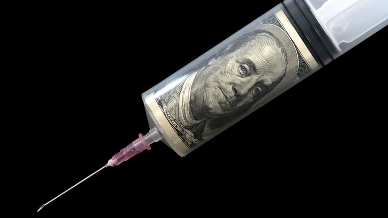 Anti-recessionary injection (vaccination) by hundred dollar denomination close up on a black background